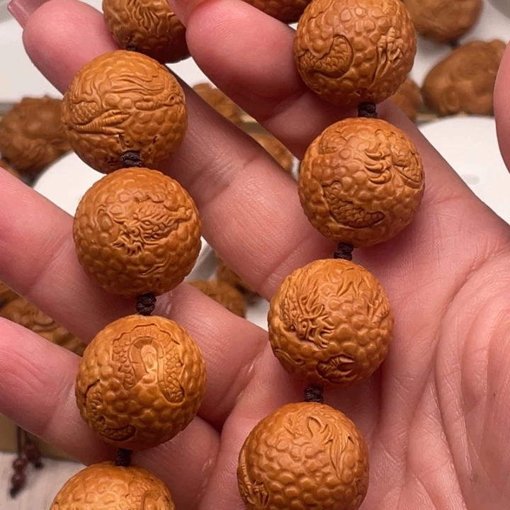 阿***金橄榄核吊坠橄榄核