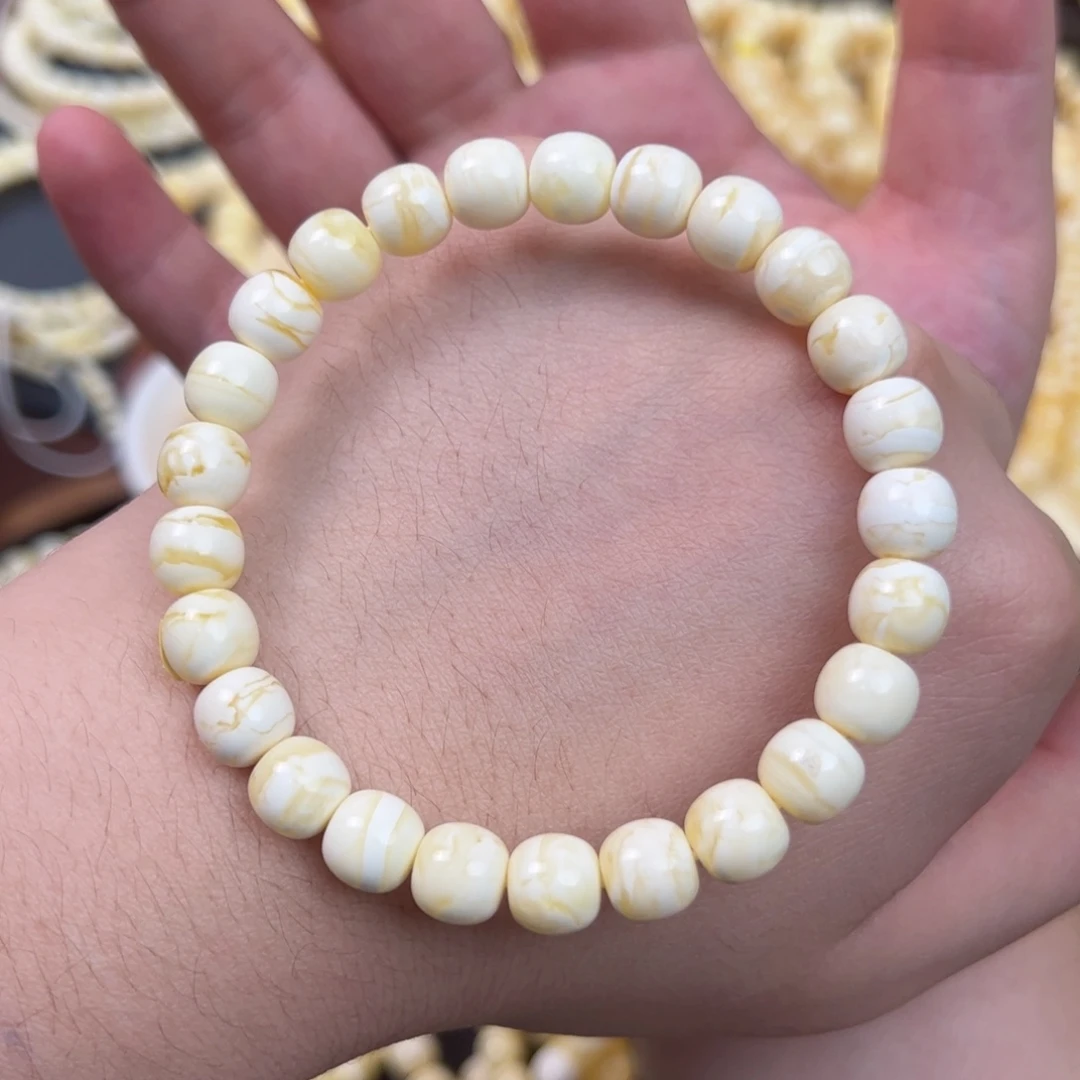 琥珀未镶嵌手串8.5m瓷白浓蜡妖花蜜蜡手串