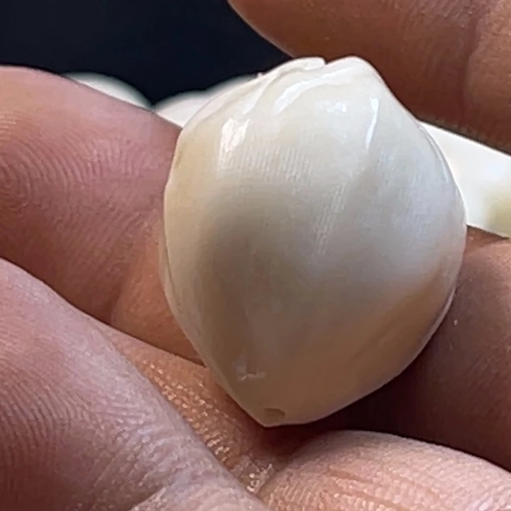 董*多象牙果雕刻橄榄型三通直径22左右