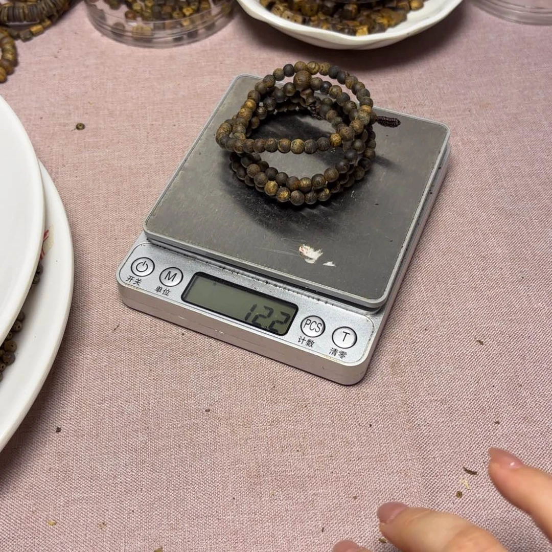 紫***衣木奇楠原材料圆珠12.2克卡5
