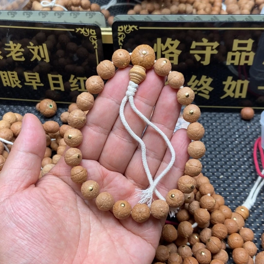 凤眼菩提吊坠11.5铜钉手串