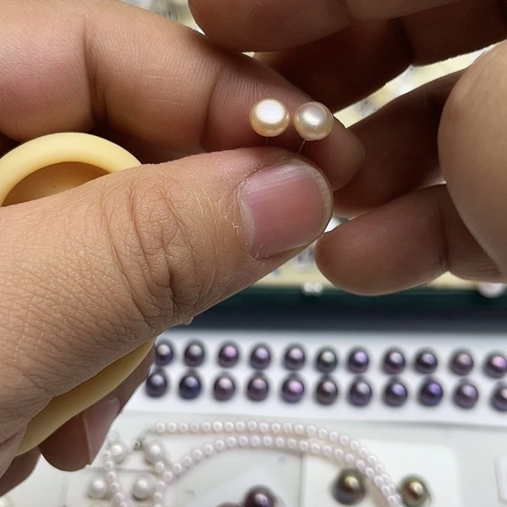 锦****耳饰银S925镶嵌淡水珍珠