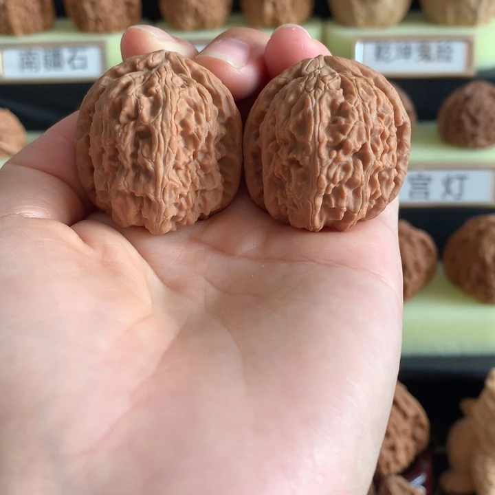 桃核把件小***呼文玩核桃白狮子白茬34+