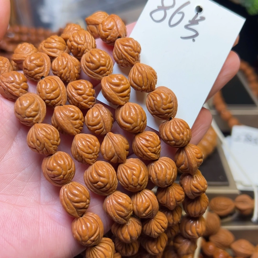 至***下桃核吊坠秦岭龙纹桃核12小金豆脖挂