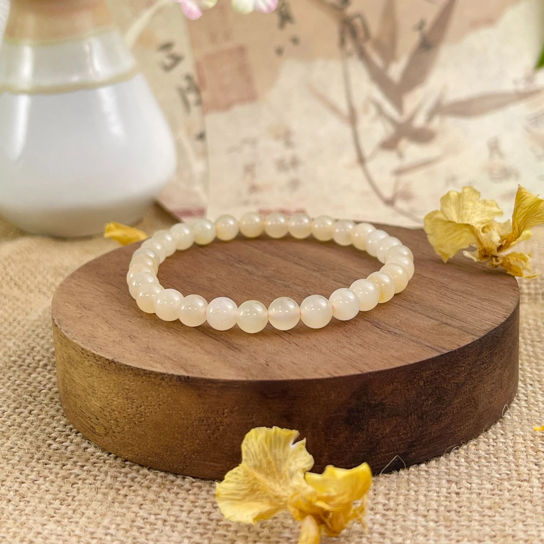 约6-7mm和田玉藕粉圆珠单圈手串