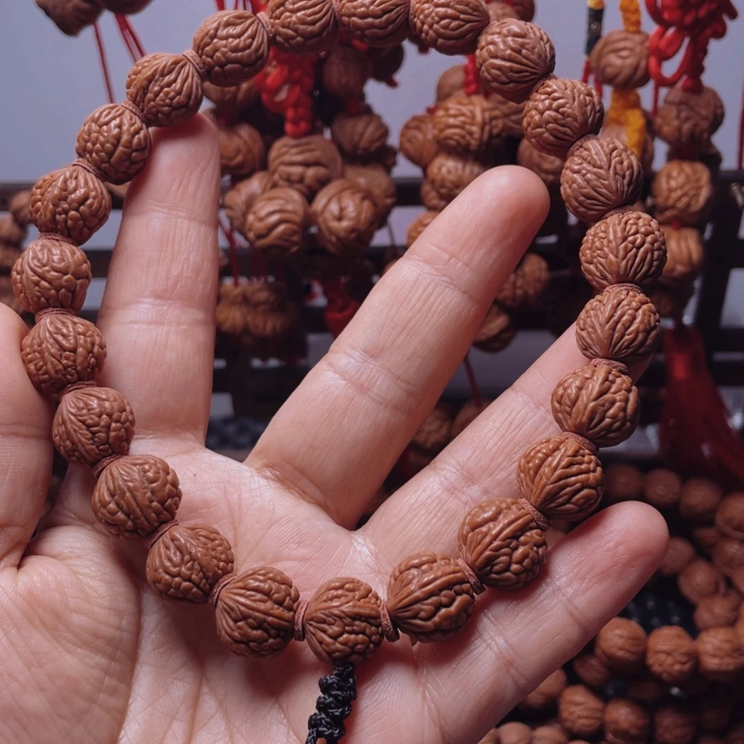 木质类龙纹桃枭手串