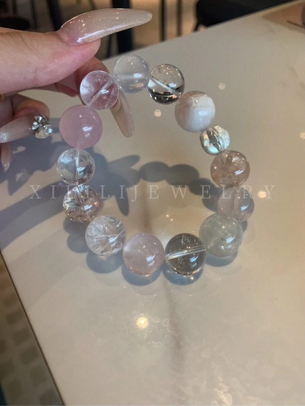 锆石（处理）《0405》原创设计轻奢蓝兔毛茶水晶手串