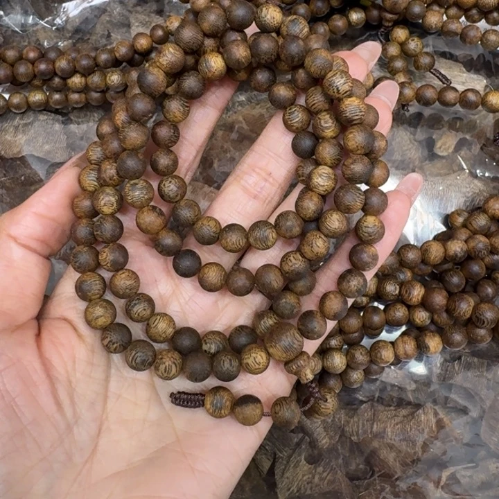 沉香手串问****）张勺子沉浮