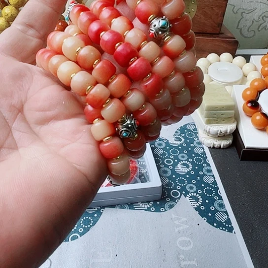 驼骨半血卡十手串