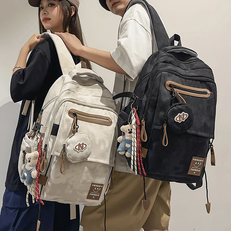 减负护脊 大容量男女书包初中生高中生大学生休闲百搭双肩包背包