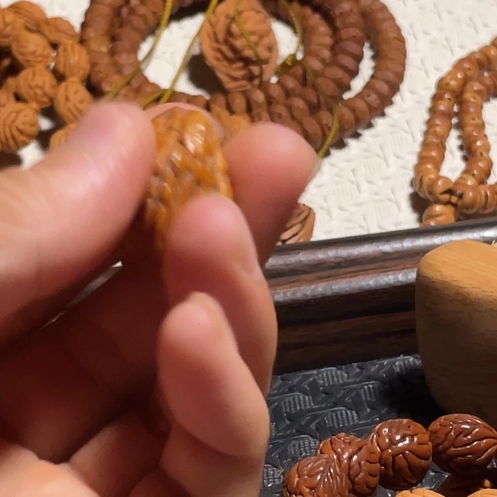 谢***说碧桃核异形三棱大尺寸