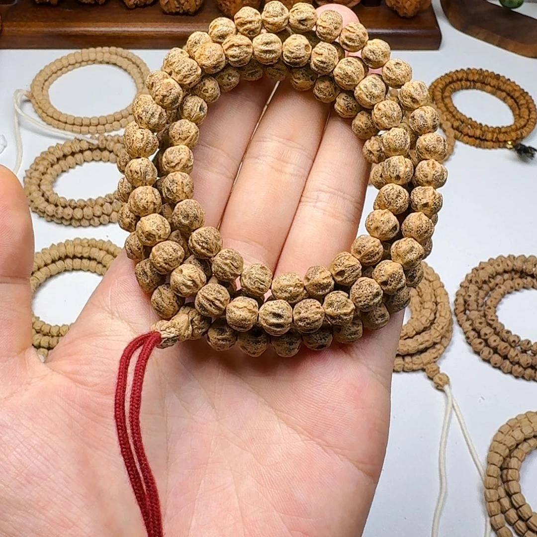 鳟***离柏香籽/百香籽吊坠