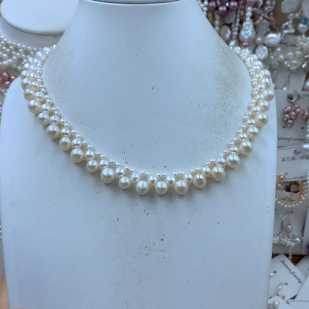 晴***呀银S925镶嵌淡水珍珠耳饰