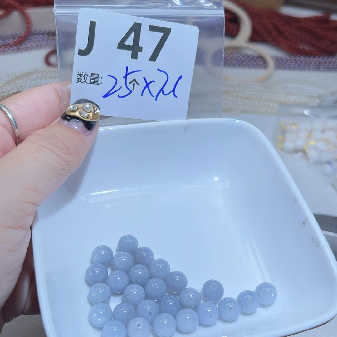 牧***人未镶嵌托帕石珠宝奇石J47。