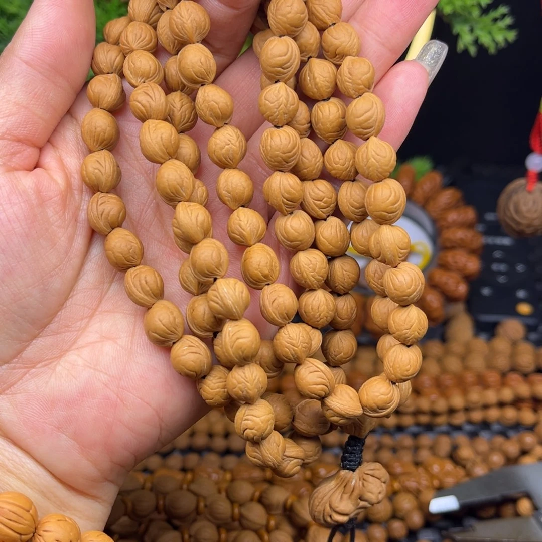 咸***)文玩核桃吊坠小奶豆脖挂