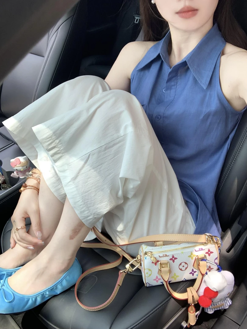 2025春夏新款港式复古翻领排扣挂脖背心百搭高腰白色阔腿裤两件套