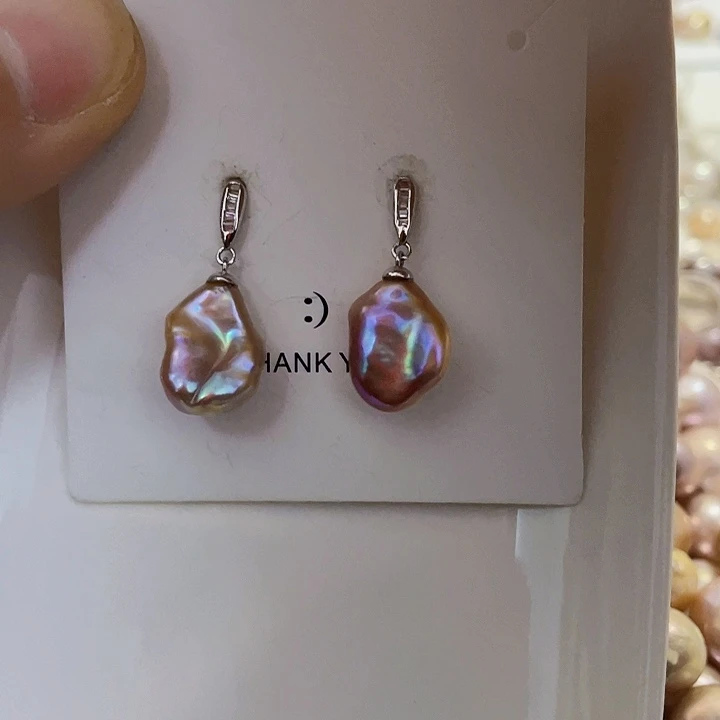 妍***淡水珍珠银S925镶嵌耳饰
