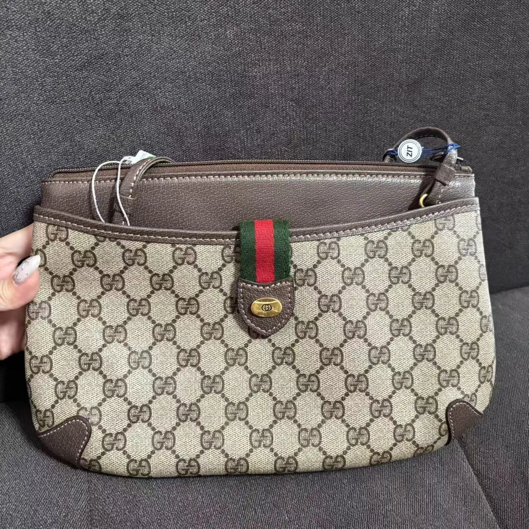 95新 GUCCI/古驰 暮野XI/古驰手拿包/09064