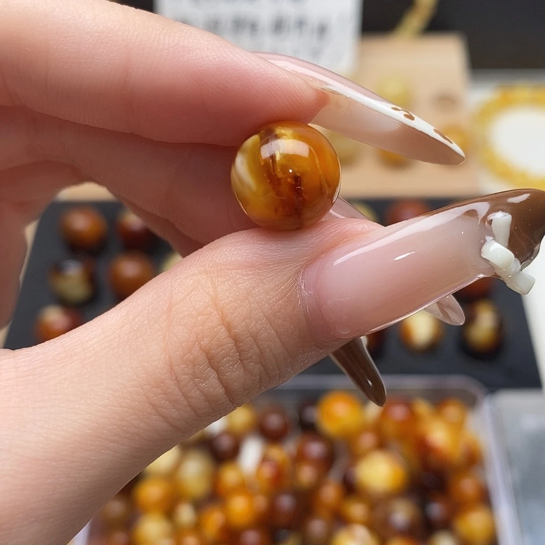 浮***沉虫珀未镶嵌裸石蜜蜡