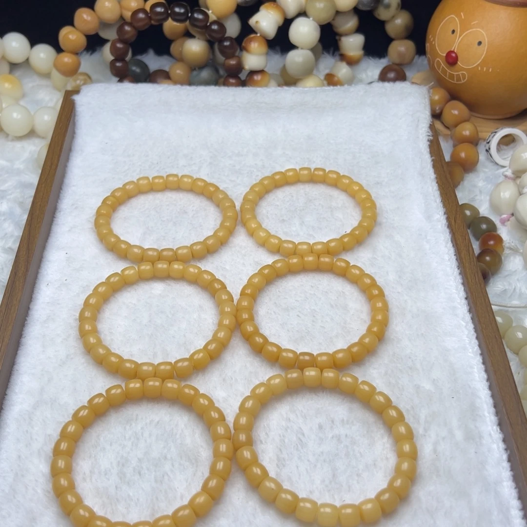 吊坠菩提根/象牙果米黄直切卡09