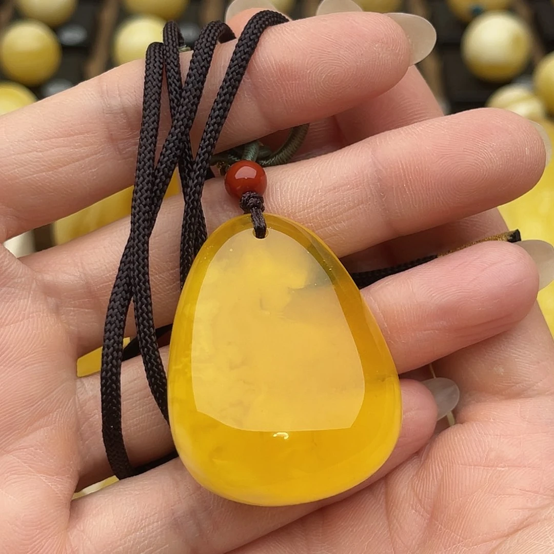 裸石琥珀未镶嵌钨*灯蜜蜡水滴微瑕鸽