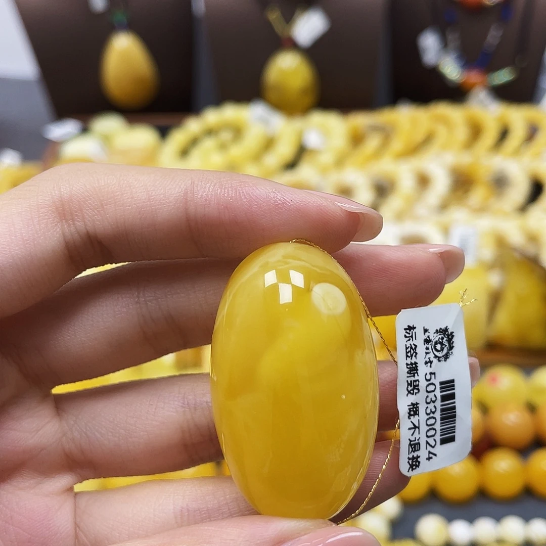 琥珀未镶嵌裸石40.6*24.3mm 花粉浓蜡