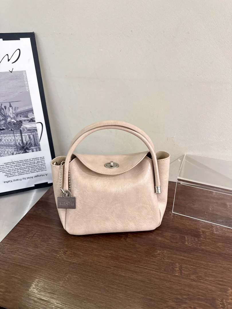 锁扣单根纯色单肩日韩斜挎包时尚女士四色嘻哈风抽绳