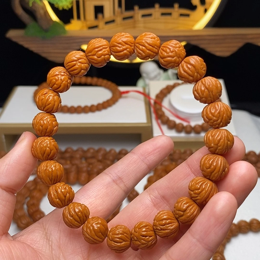 哎***喂桃核手串12mm野生凤羽聚宝盆桃核手串