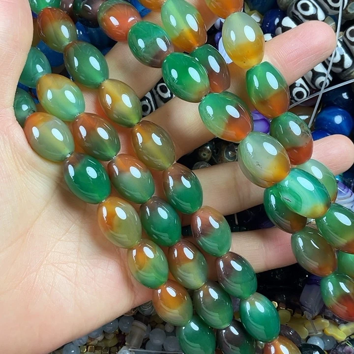 查罗石散珠合金卡13*18孔雀玛米珠一条