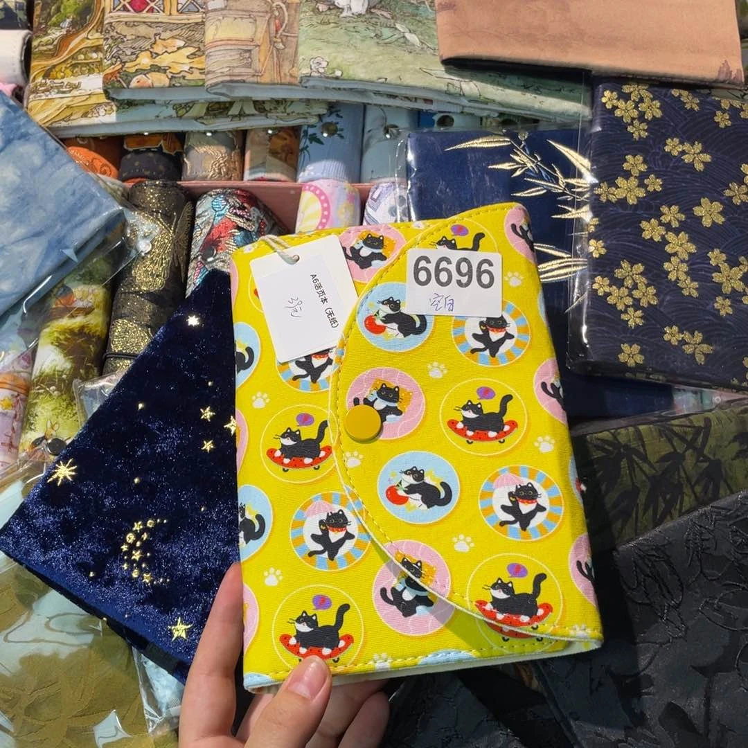 张***）织绣A6活页带空白纸6696