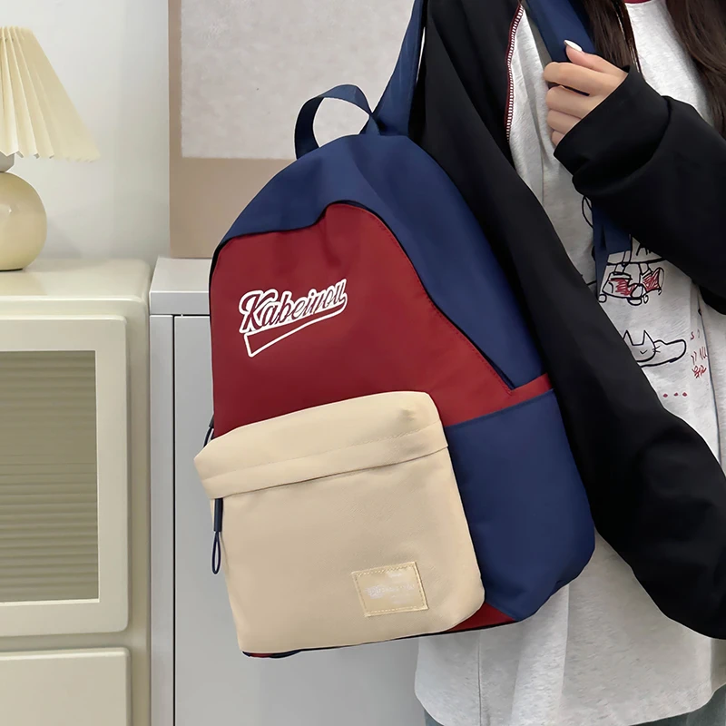 双肩包2025女秋冬小众原创简约撞色休闲旅行背包初高中学生书包