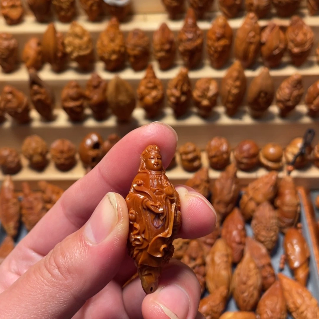 橄榄核把件麒麟观音