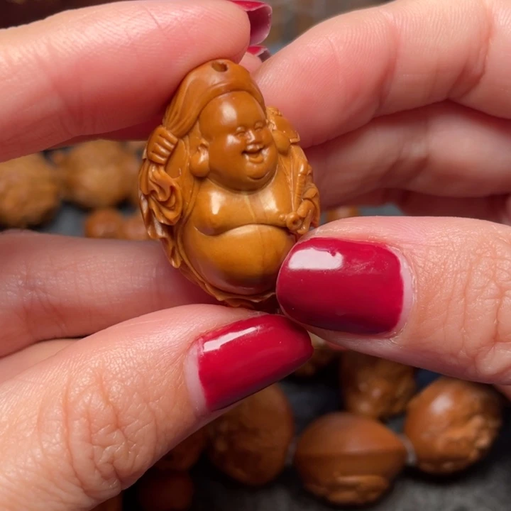 橄榄核吊坠C**里橄榄核