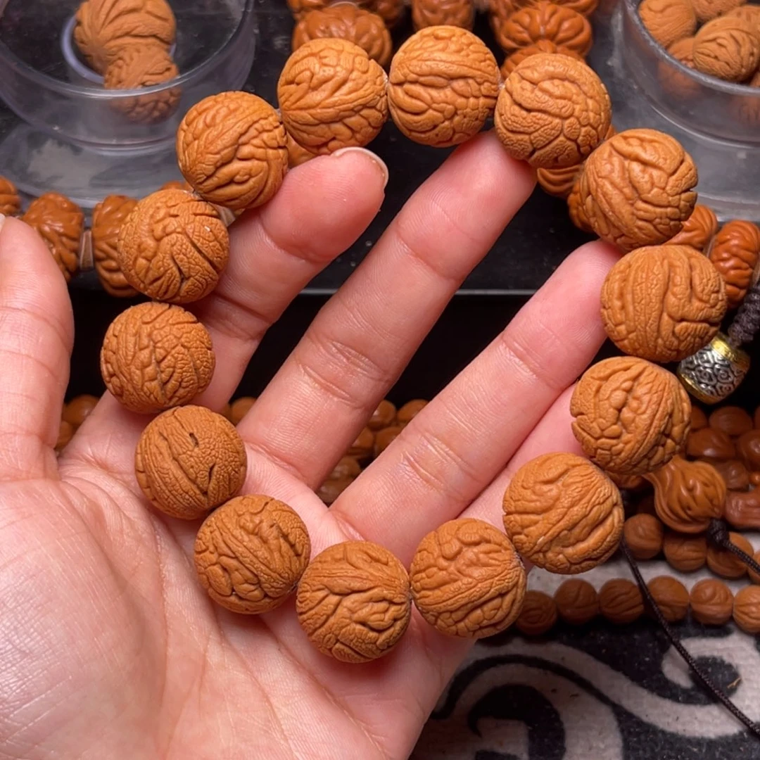 手串桃核金丝龙珠1.7