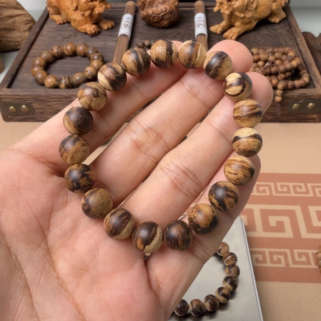 沉香沉香碎屑达拉干99沉1.0cm单圈