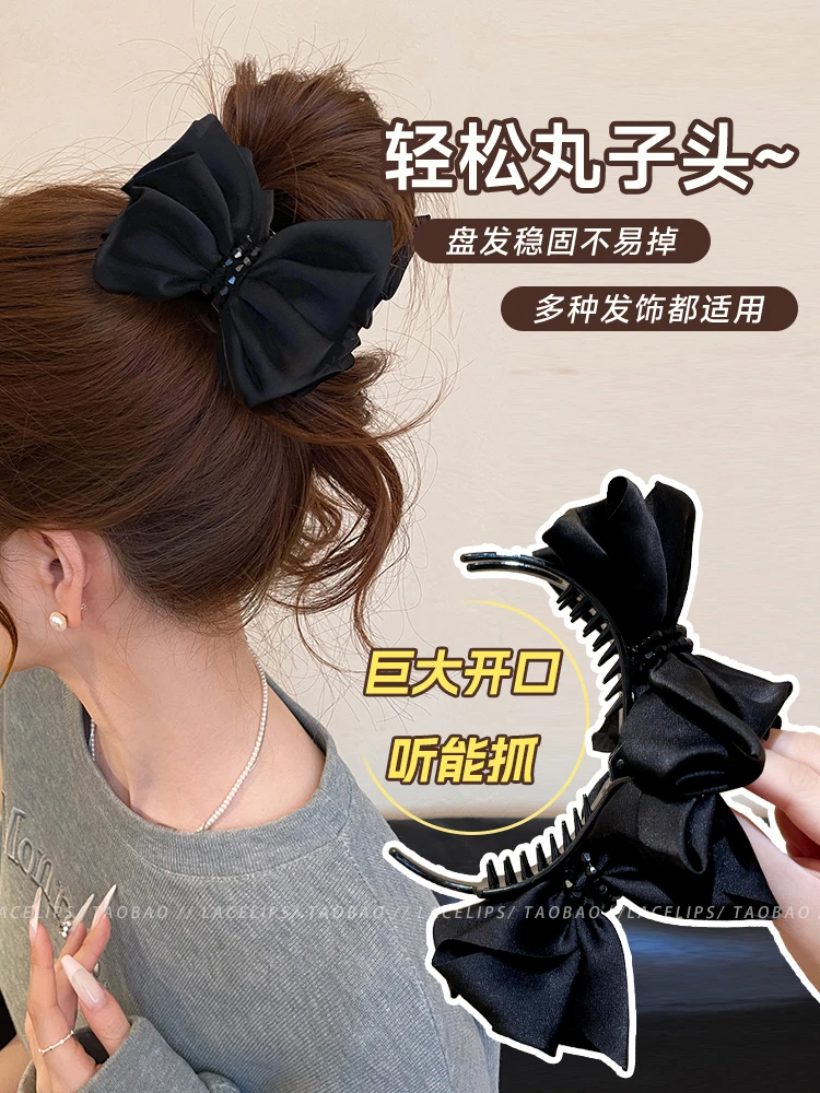 黑色蝴蝶结丸子头抓夹女高级感2025新款鲨鱼夹饱满后脑勺发夹发饰