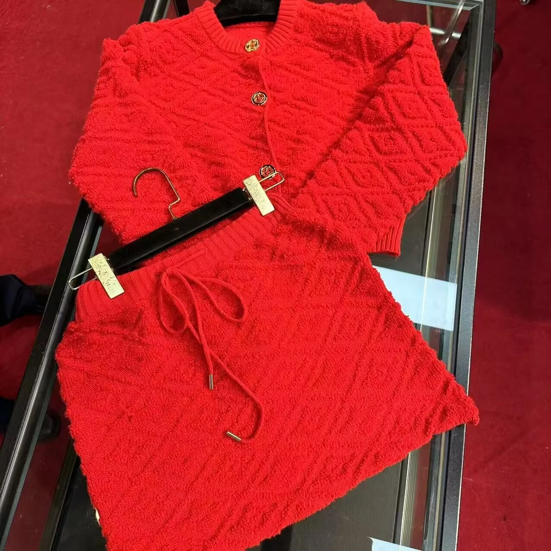 4573 凹凸纹立体感开衫圆领上衣短裙套装时尚两件套