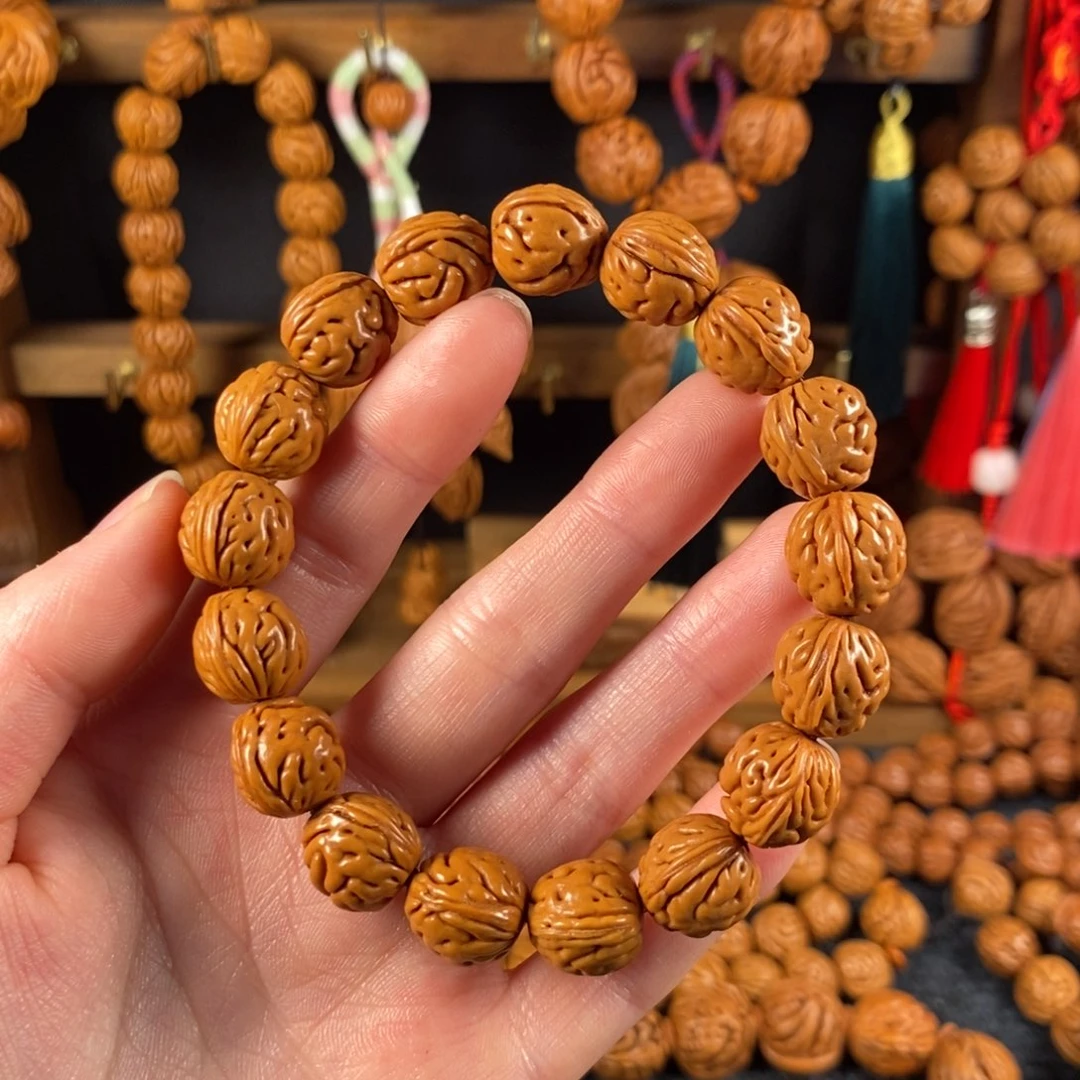 吊坠桃核桃枭手串