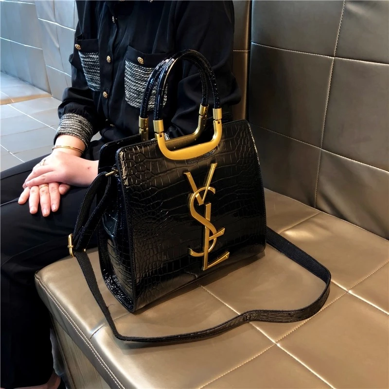 香港品牌高级感大容量手提托特包2025新款洋气百搭通勤单肩斜挎包