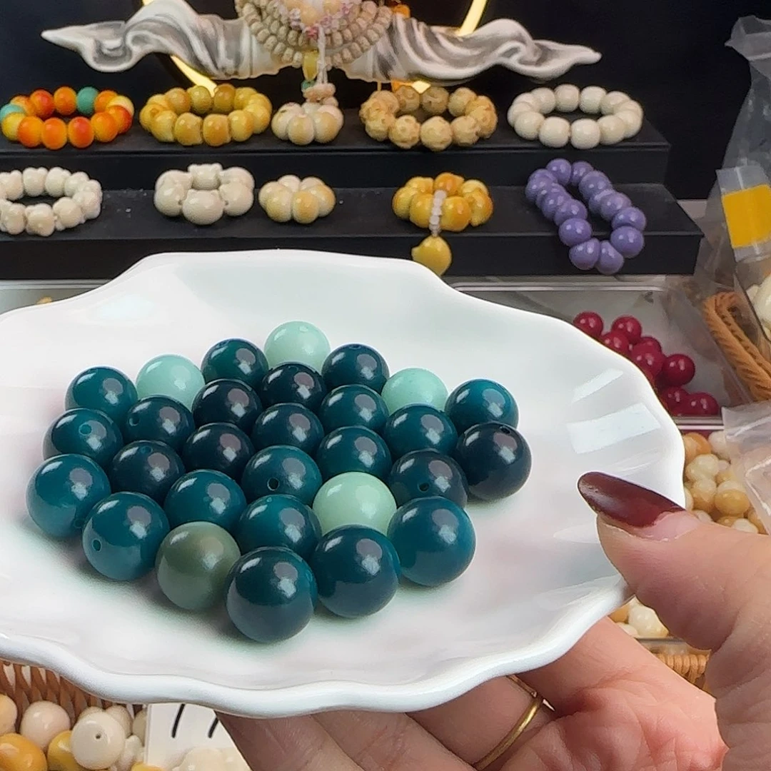 菩提根/象牙果手串卡14.5-15孔雀蓝圆100颗