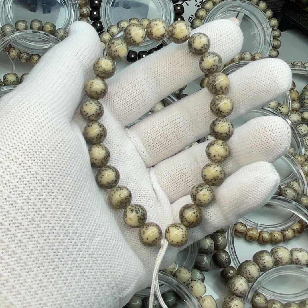 星月菩提手串海南星月菩提石玉料10圆龙蛋手持