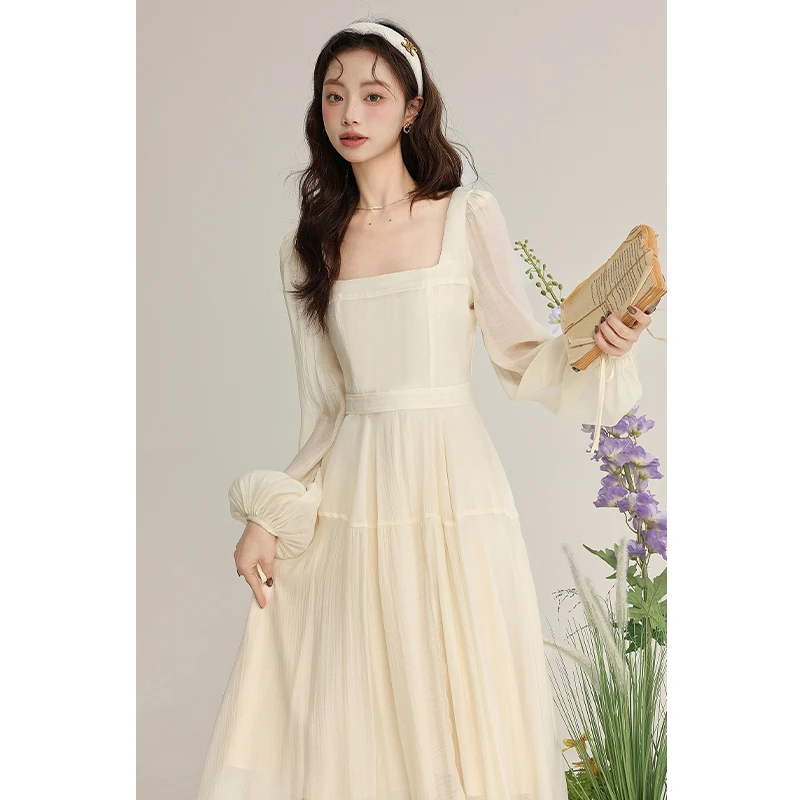 Qiuzixian【风传花信】气质温柔风杏色长袖连衣裙新款L240383