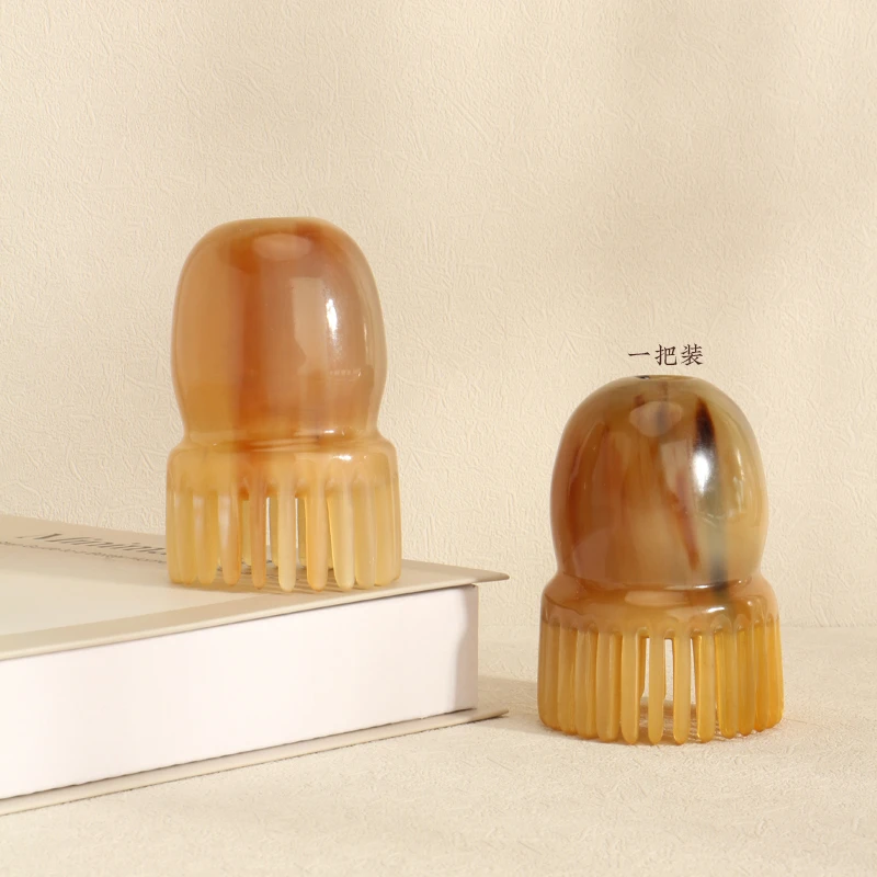 一个装章鱼造型牛角头部按摩梳头皮按摩器洗头梳小巧便携高7-8CM