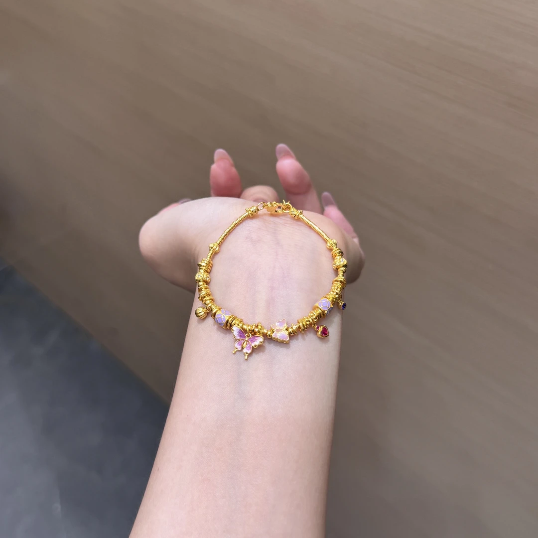 【菠萝珠宝】足金999  时尚多巴胺爱心蝴蝶手链  金重：19.99克