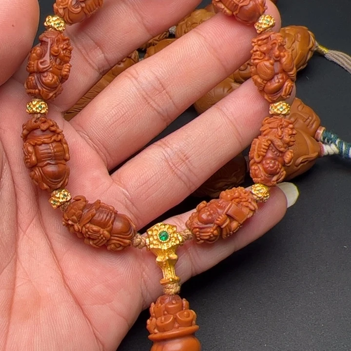 哒***哒橄榄核手串/手链橄榄核雕刻的作品