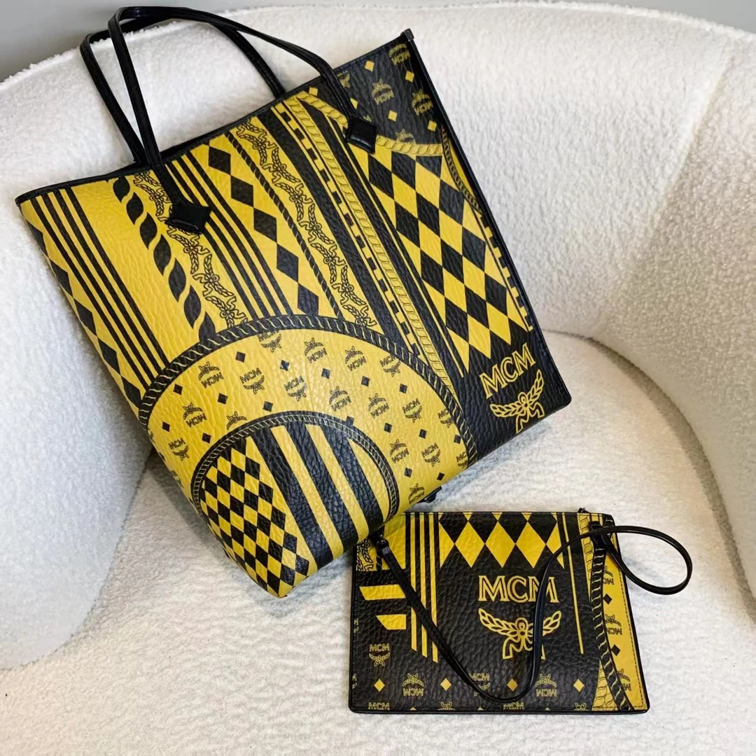 99新 MCM 壹臻/黄拼黑竖版子母tote 59884267