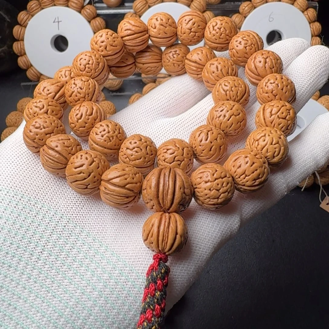 桃核手串盘锦野生大肌肉半挂