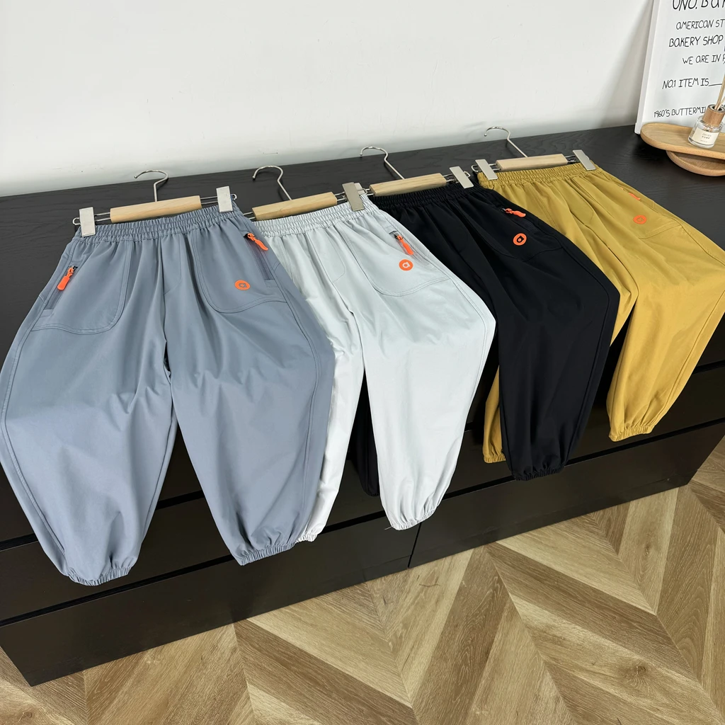 2025春季新款松紧腰中大男童女童梭织运动裤收口休闲裤2502