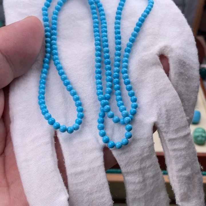 T****直径3+蓝色米珠链一条