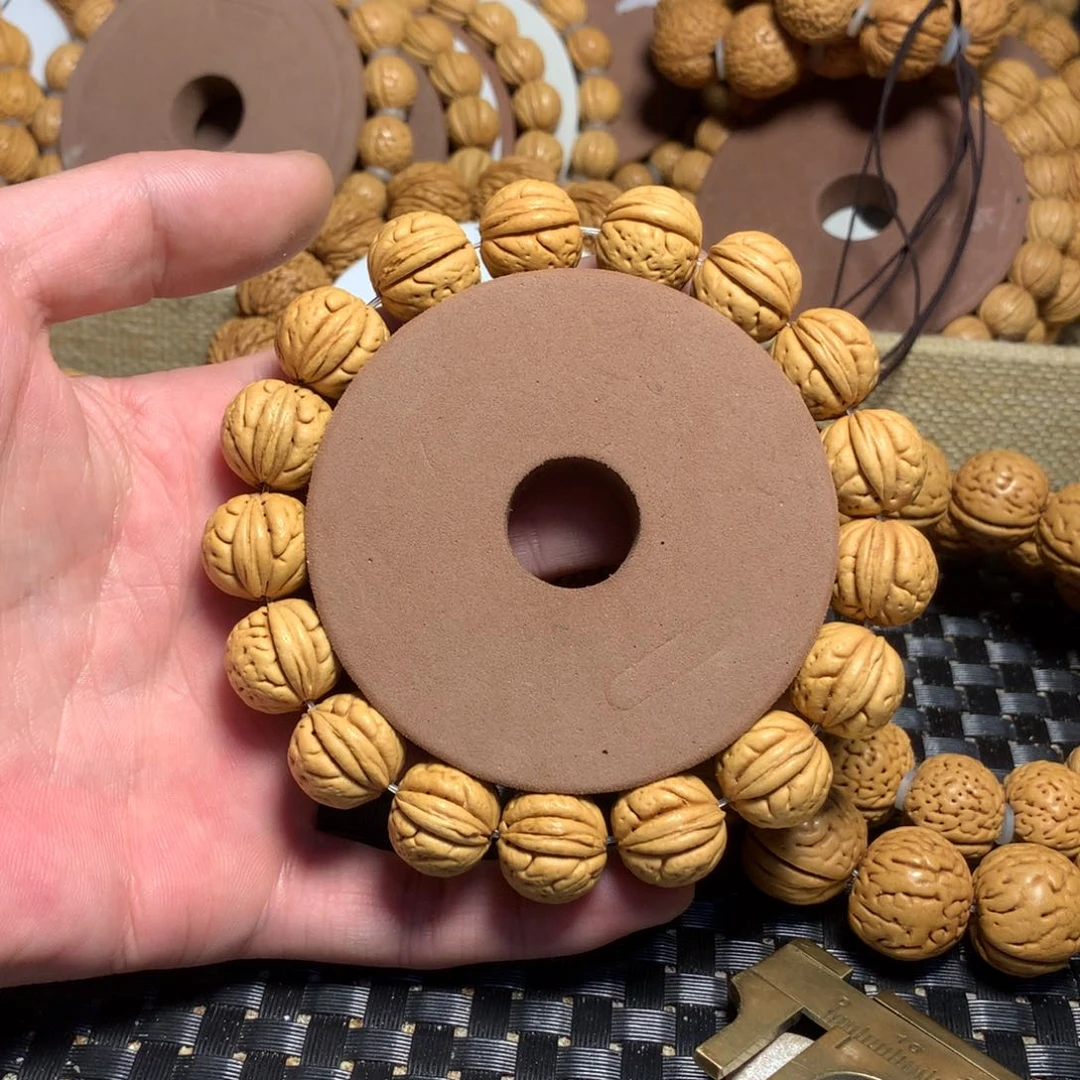 桃核手串憶****_野生小金豆